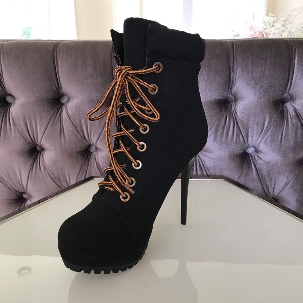 High heeled boot size 10. NEW